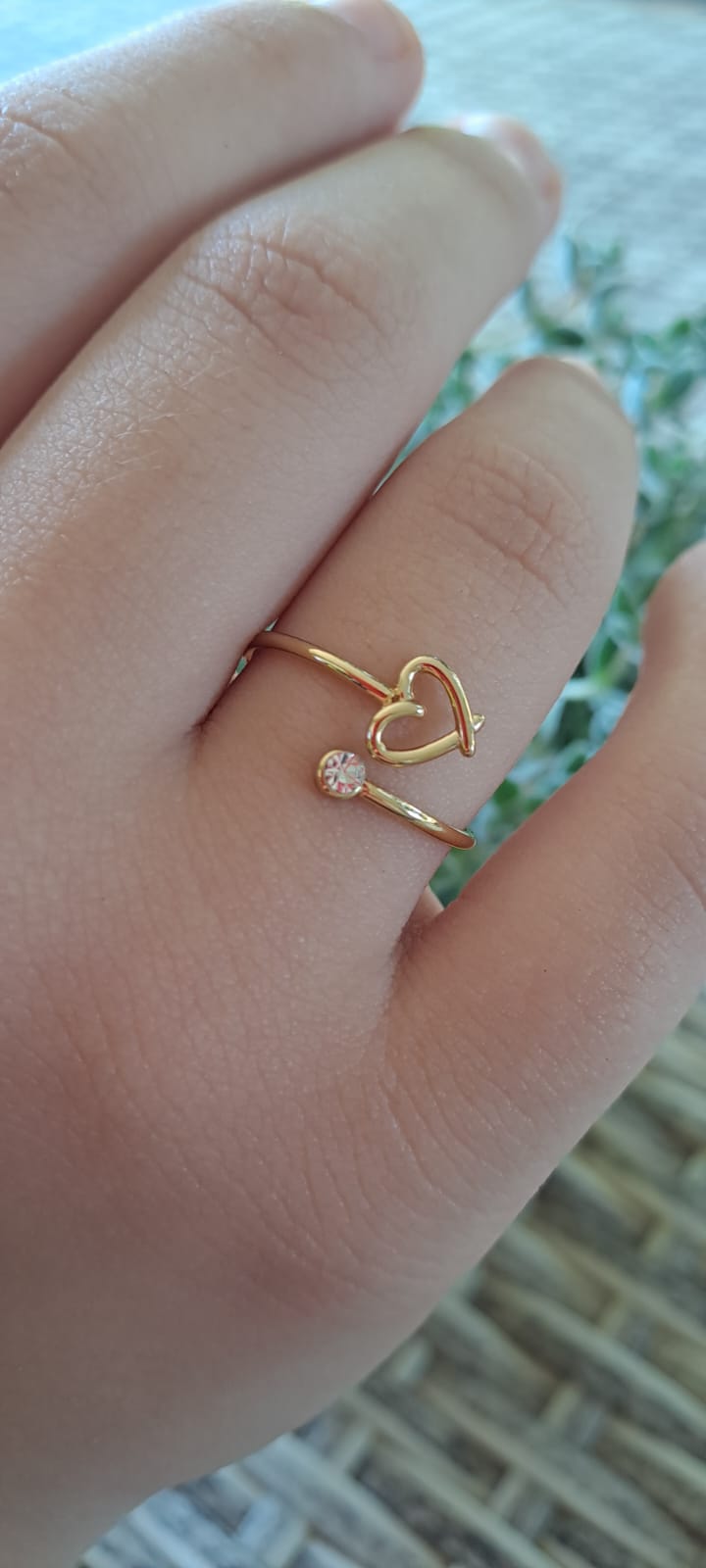 ANELLO REGOLABILE CON CUORE E PUNTO LUCE